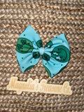 Green smiley bow