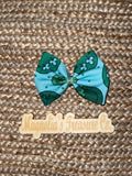 Green smiley bow