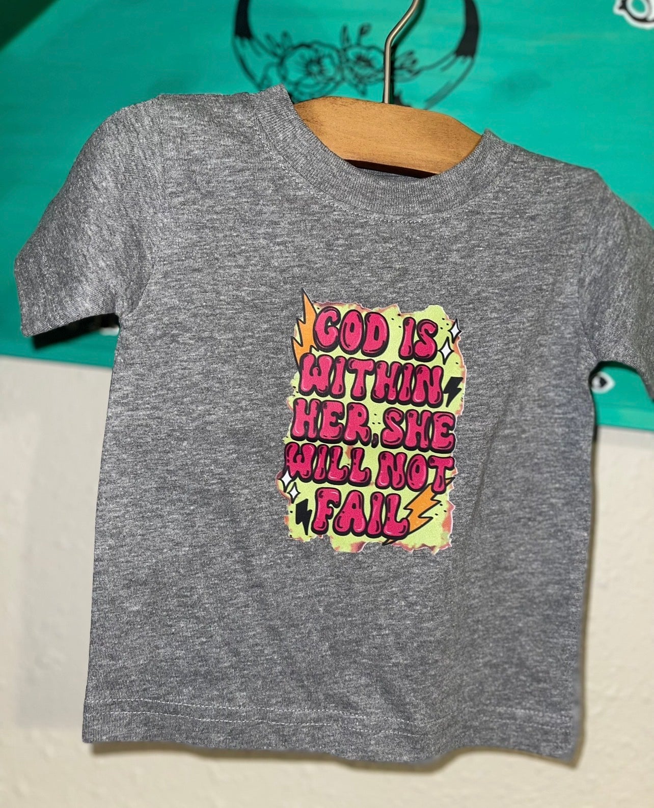 God’s within her tee