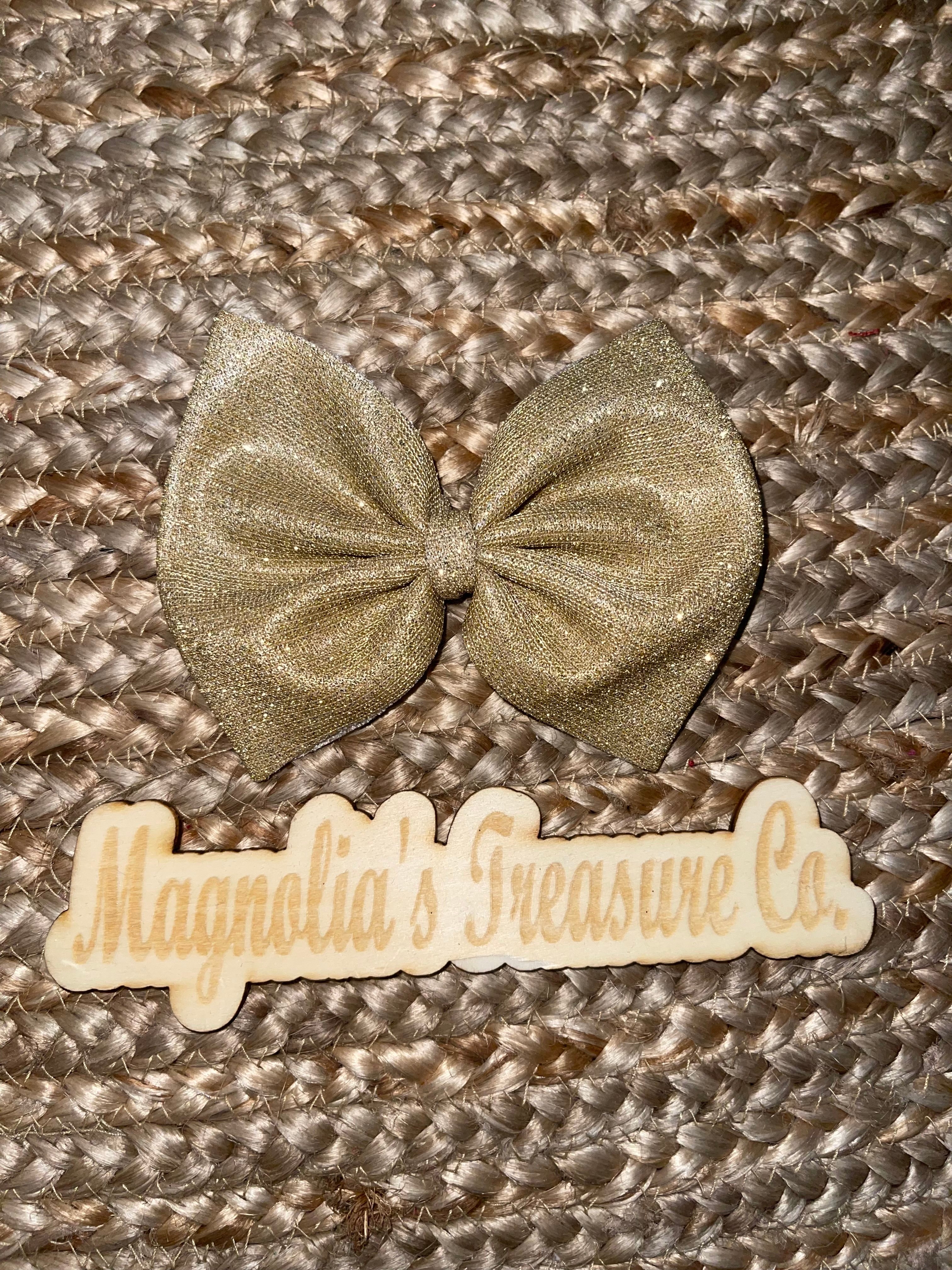 Sparkly gold bow